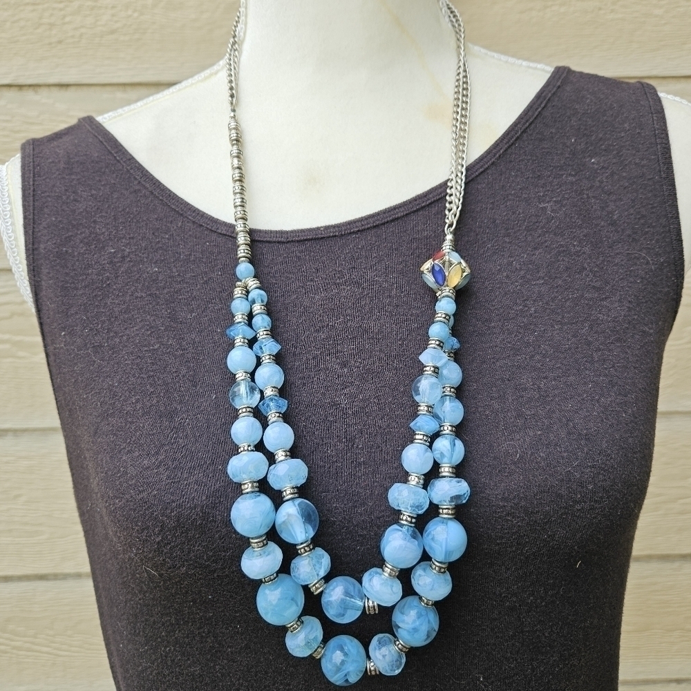 light blue layered necklace on silver tone chain with multicolor ball